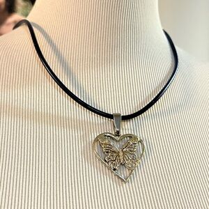HOUSE OF MORGAN BUTTERFLY HEART PEWTER PENDANT ON A BLUE RUBBERIZED CORD